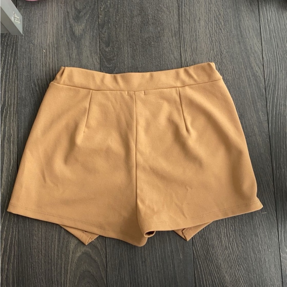 Tan mini skort. High rise. Size S.